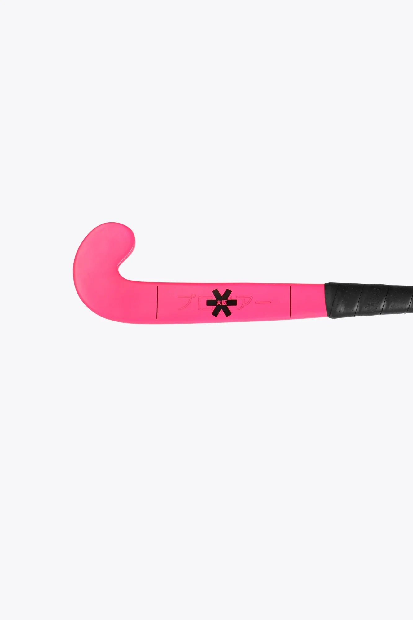 A close-up of a bright pink field hockey stick with a black handle wrap and a black asterisk logo, set against a plain white background.