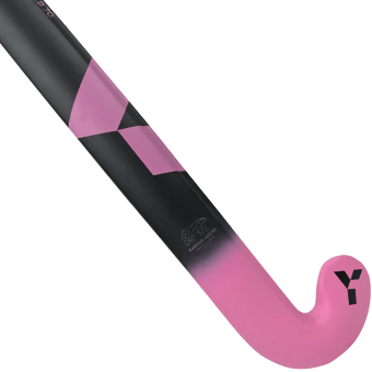 A close-up of a field hockey stick showing its black and pink shaft with a bright pink curved blade, featuring a black 'Y' logo on the blade and a 'Camel Racing' sponsor logo on the shaft.